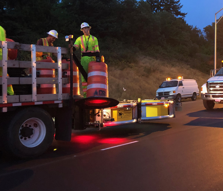 AGS Team Members Putting Out Orange Barrels