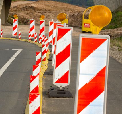 flashing traffic control signs on a road