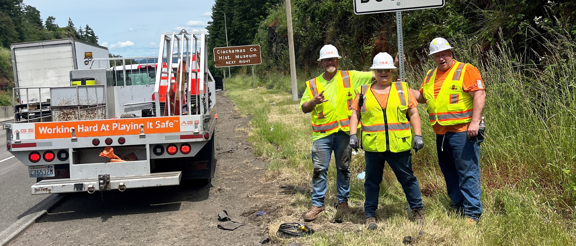 Image of AGS Truck and Team Members